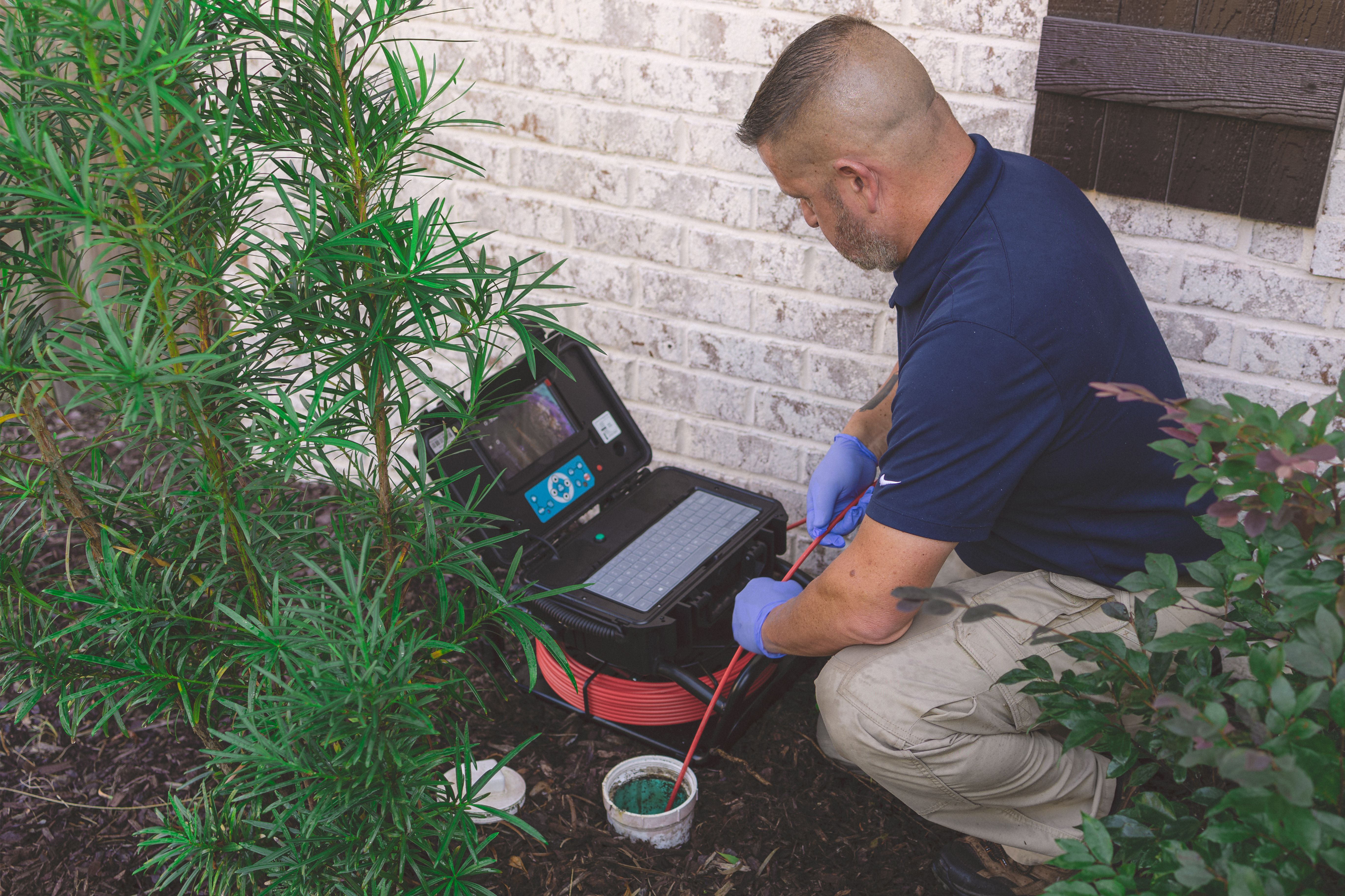 WIN Home Inspector checking the sewer scope camera