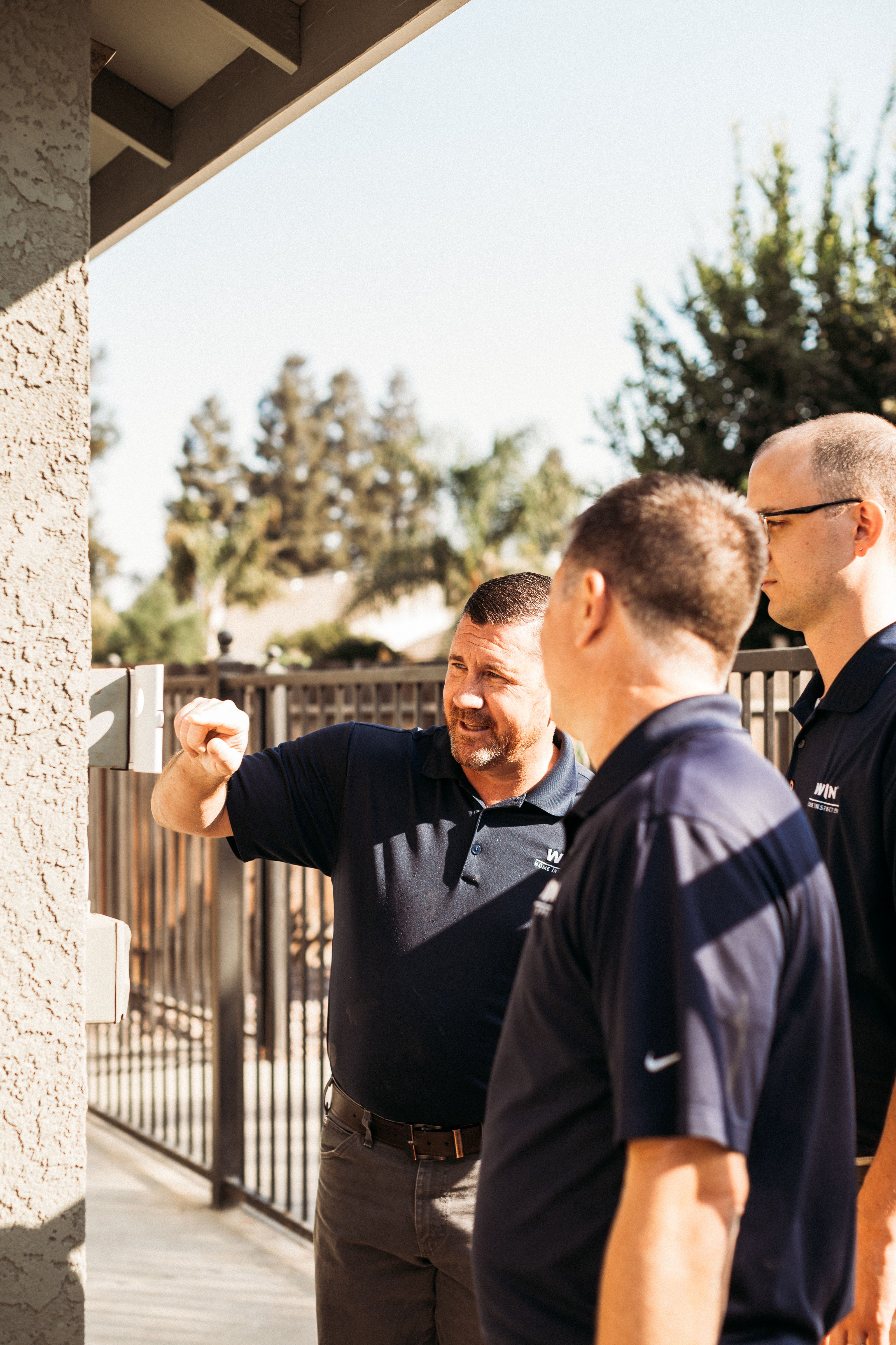 A team of WIN Home Inspector discussing about home inspection