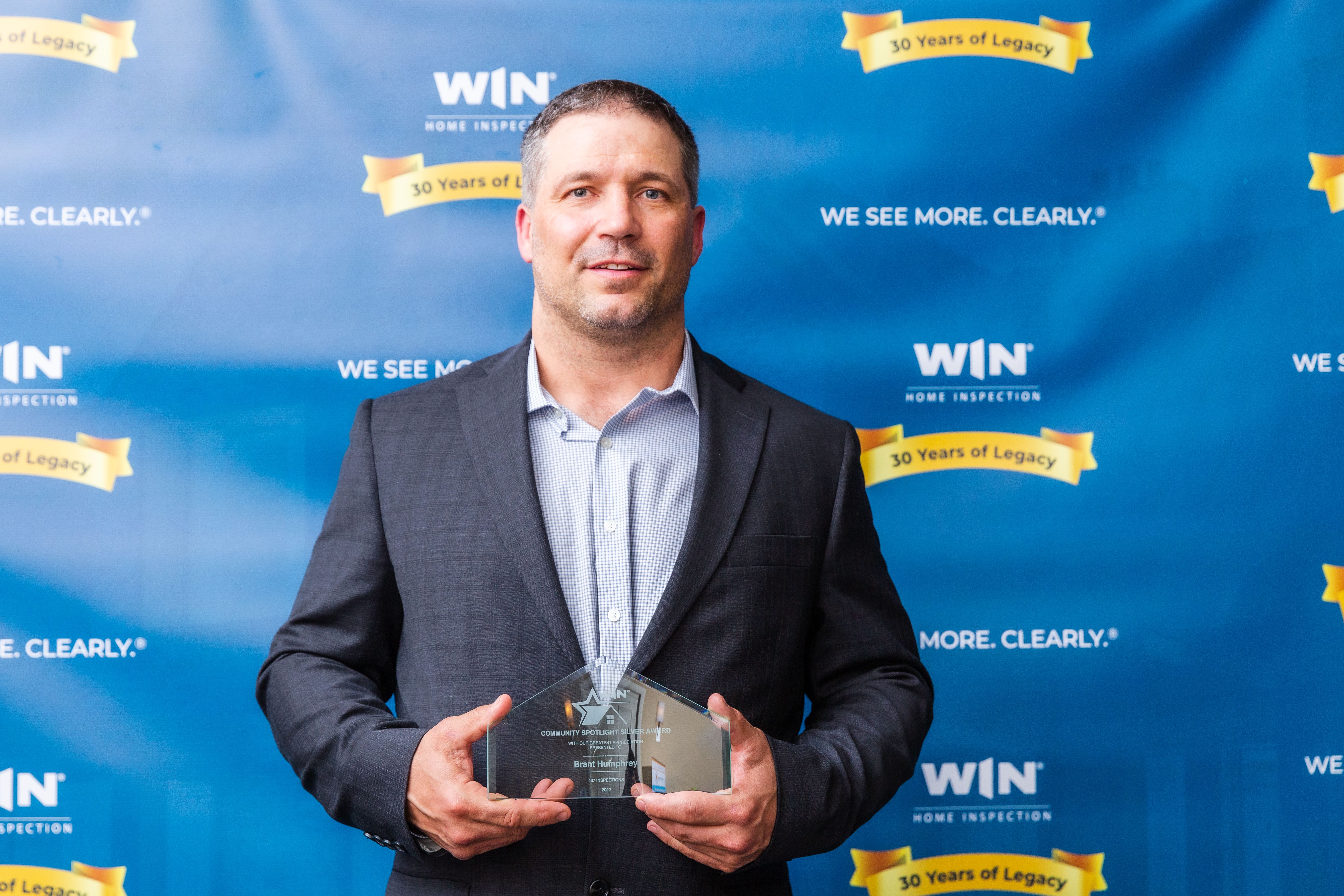 WIN Home Inspector 'Brant Humphrey' with an award