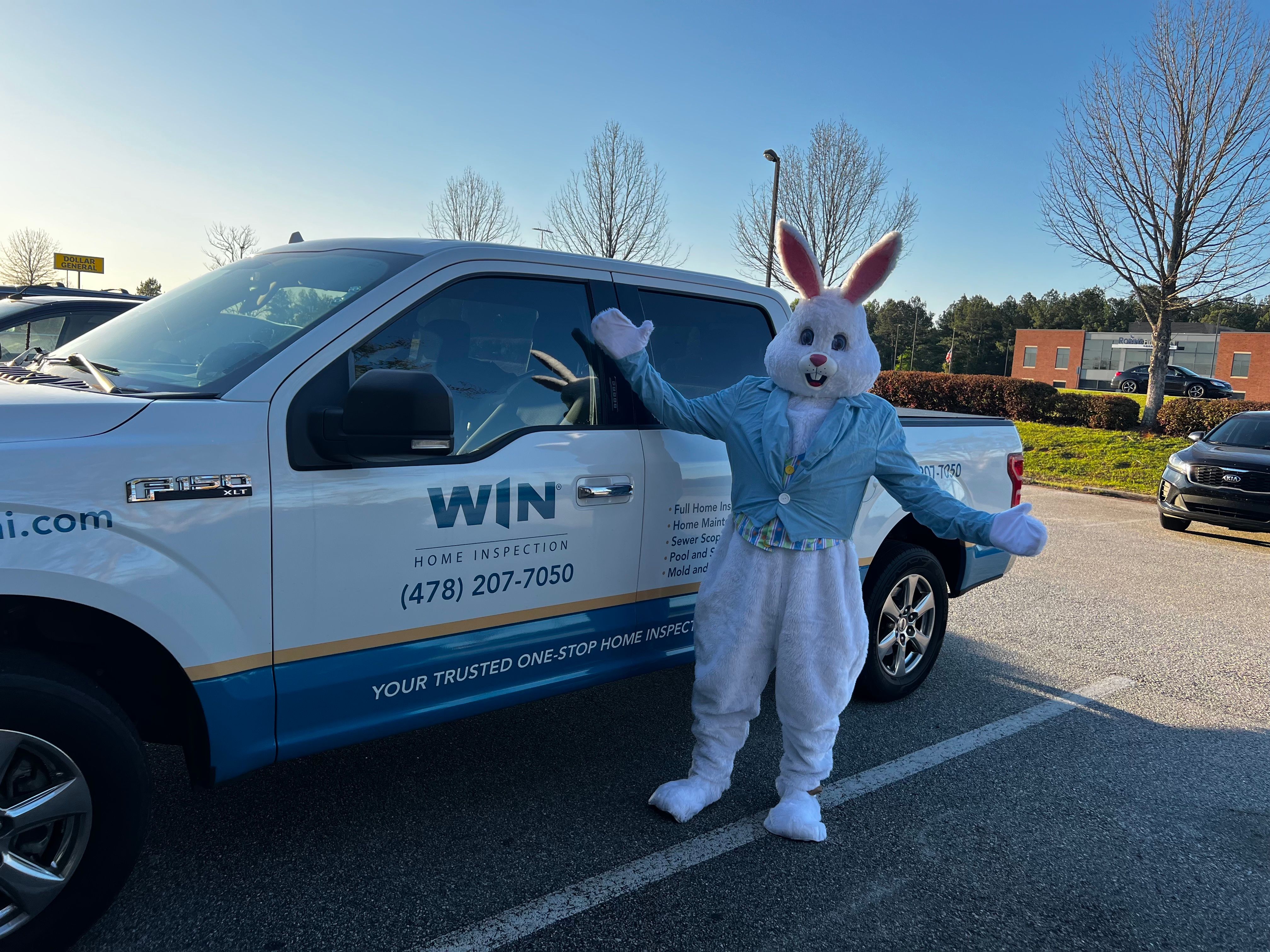 WIN Home inspector in white apron and gloves preparing food.