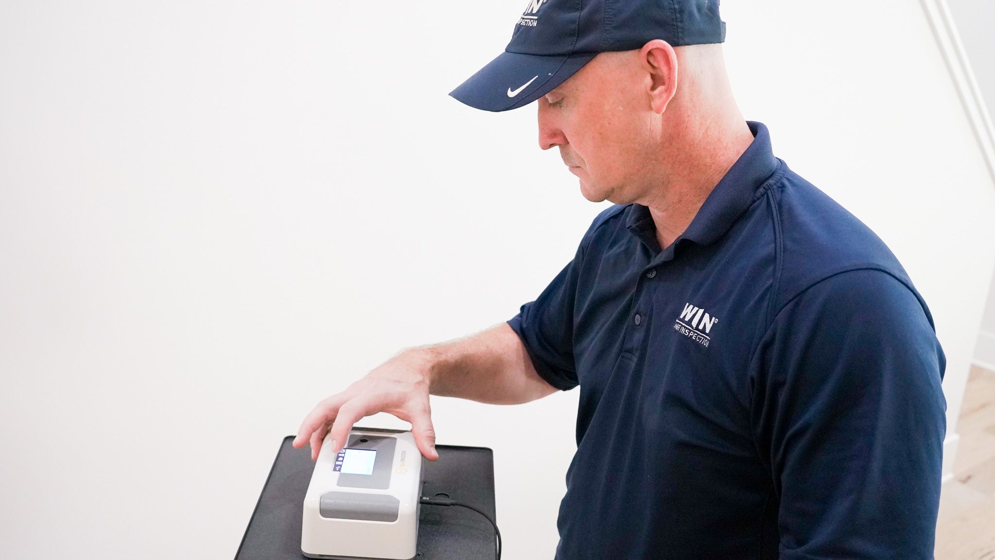Home Inspector doing a radon inspection
