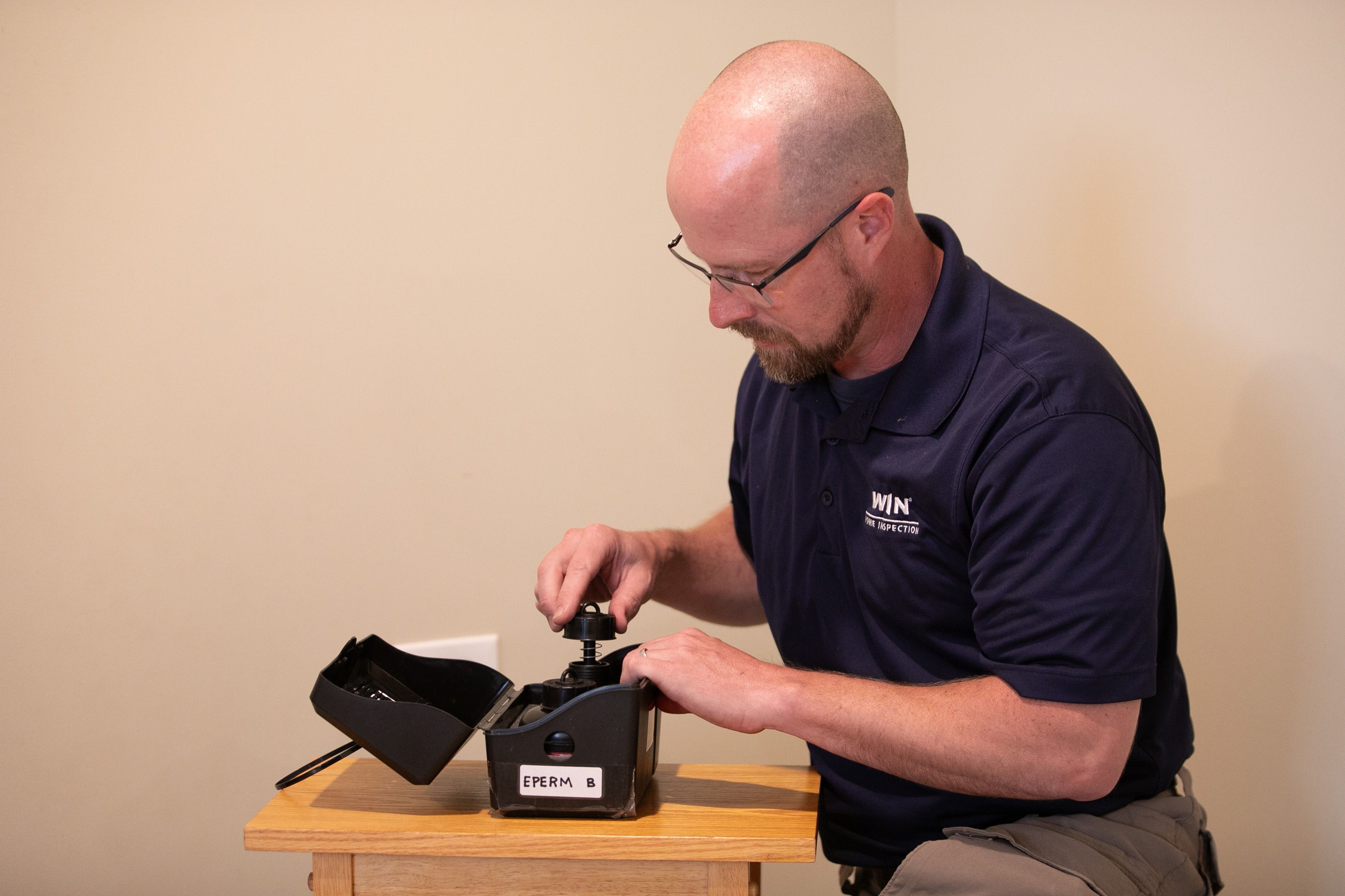 WIN Home Inspector performing a Radon Test