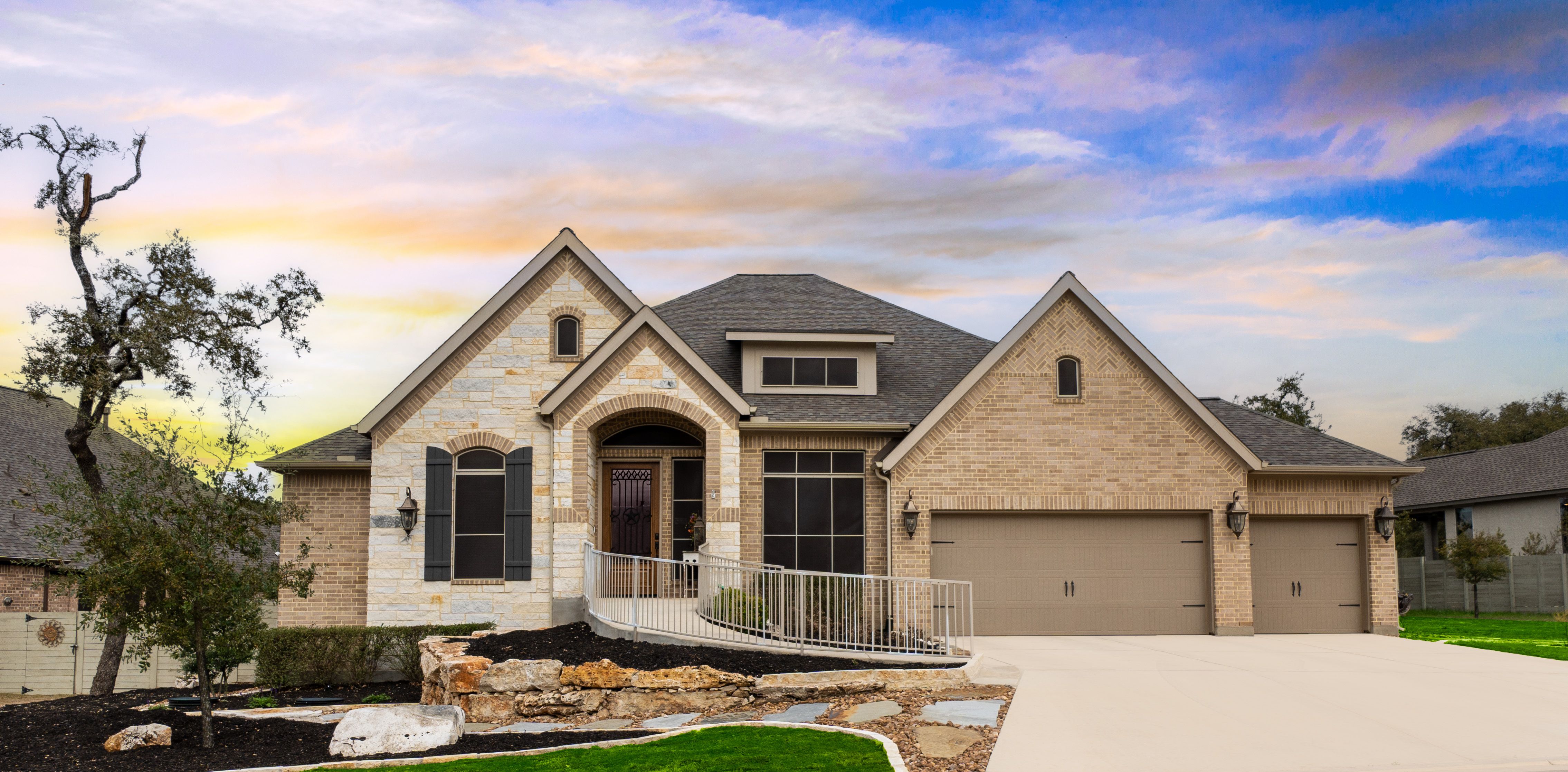 A house with a ramp and a driveway