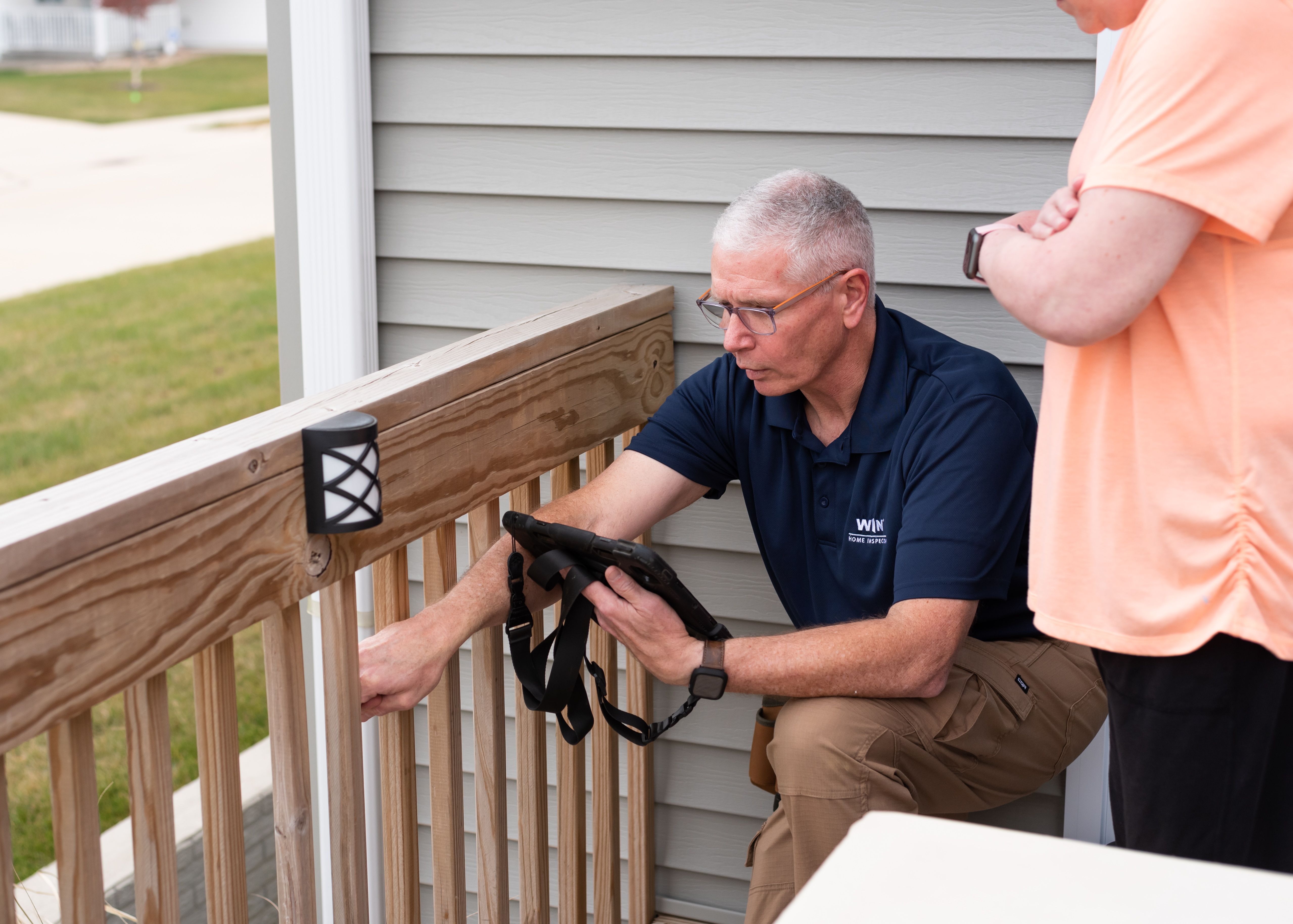 WIN Home Inspector doing a deck inspection