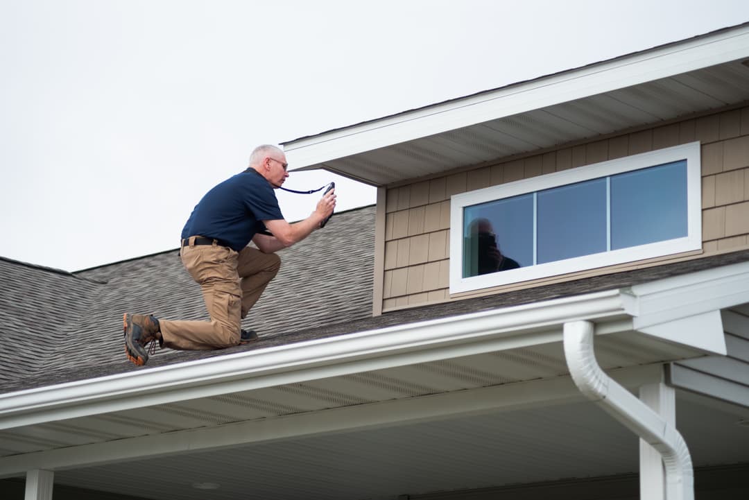 WIN Home Inspector doing wind mitigation inspection 