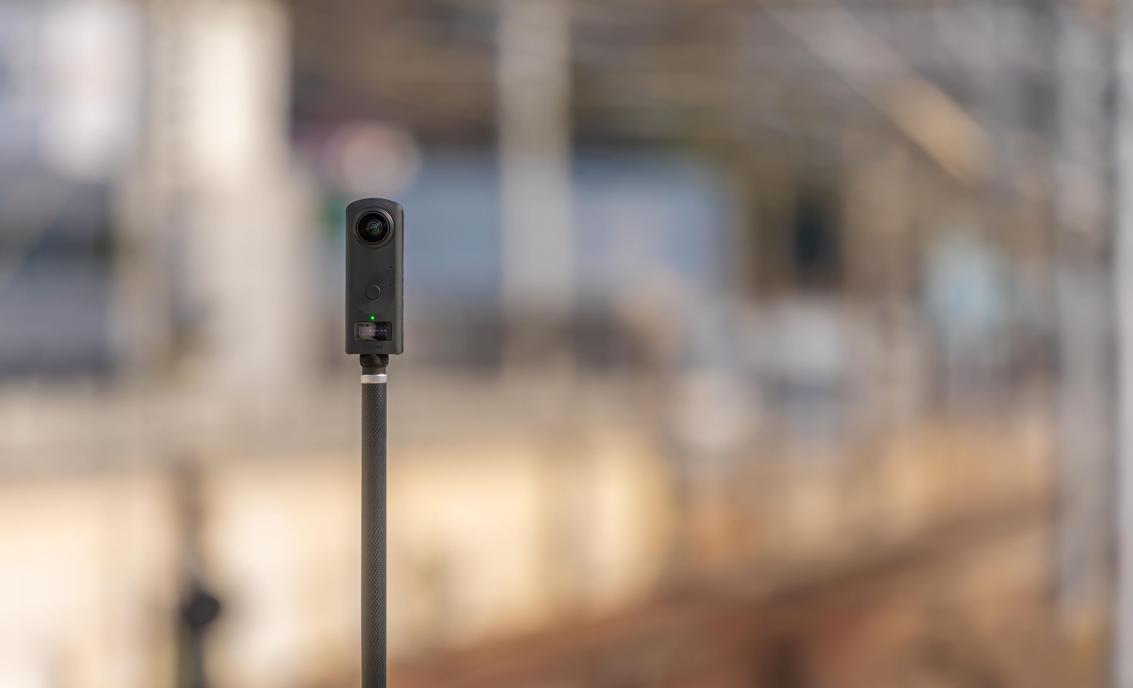 A 360 camera on a pole 