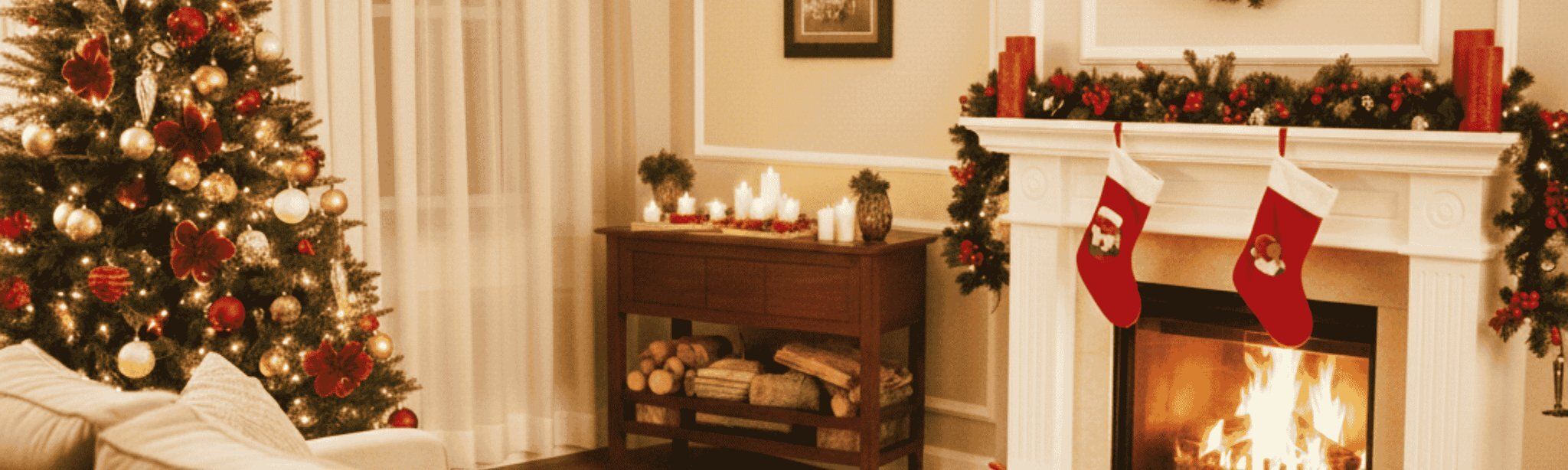 A living room decorated for Christmas with a lit fireplace.