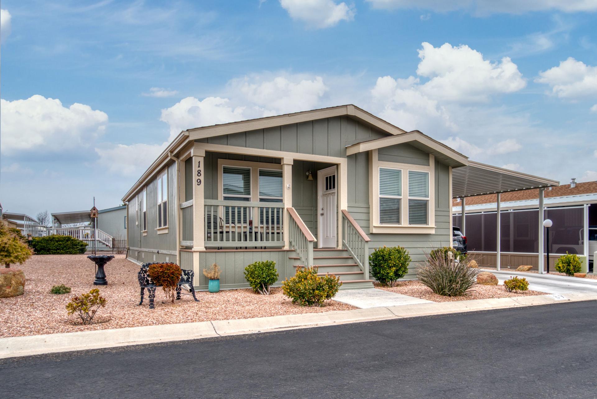 Manufactured Home with a porch and a driveway