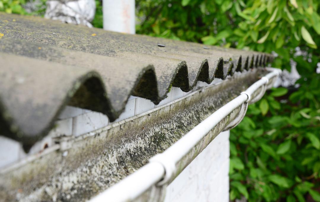 Closeup of a roof with a drainpipe