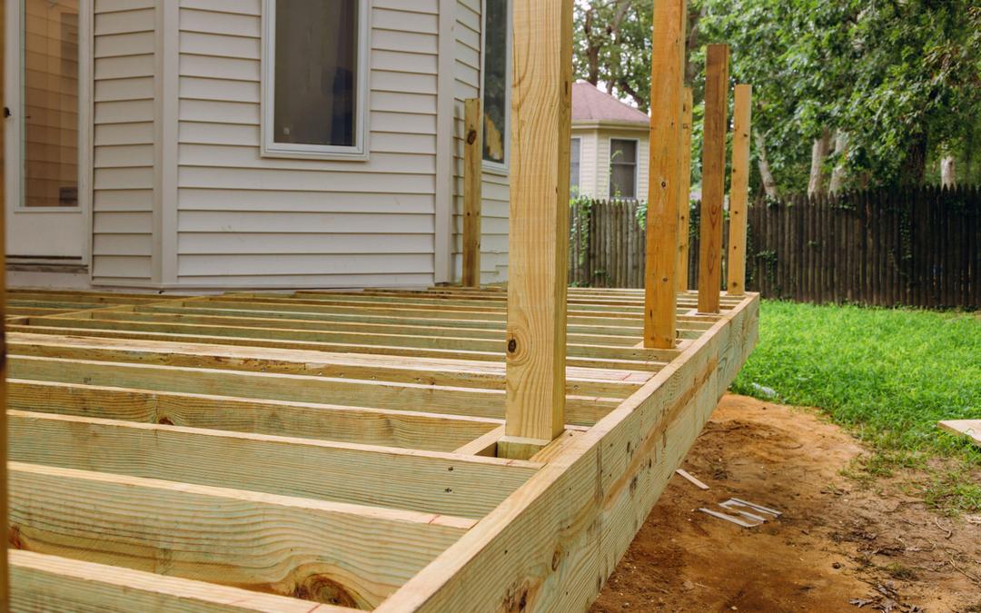 A house with wooden deck in construction