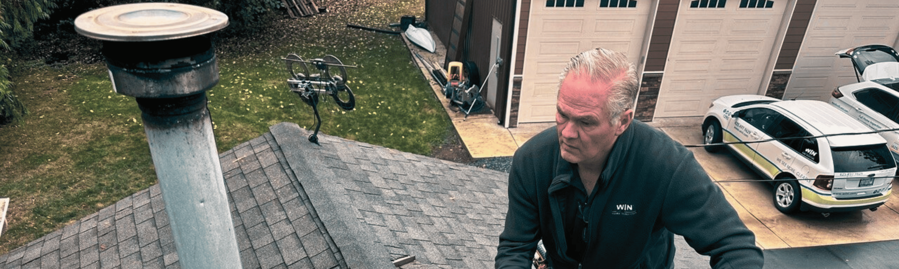WIN Home Inspector doing a roof inspection