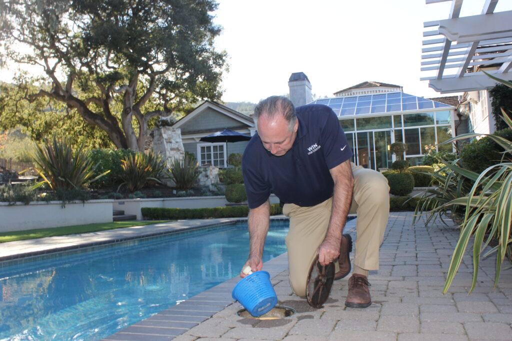 WIN Home Inspector doing a pool inspection