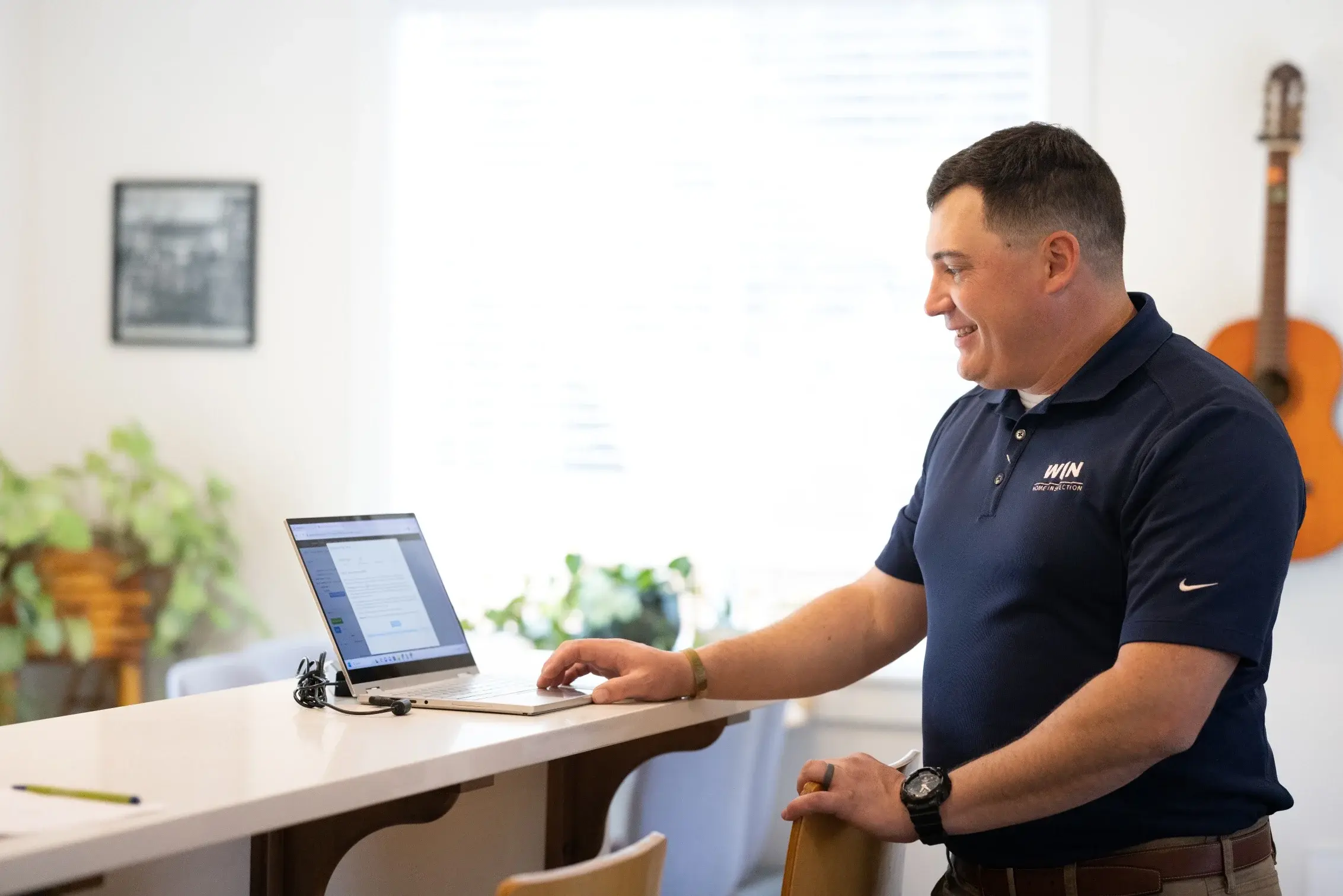 WIN Home Inspector with his Laptop
