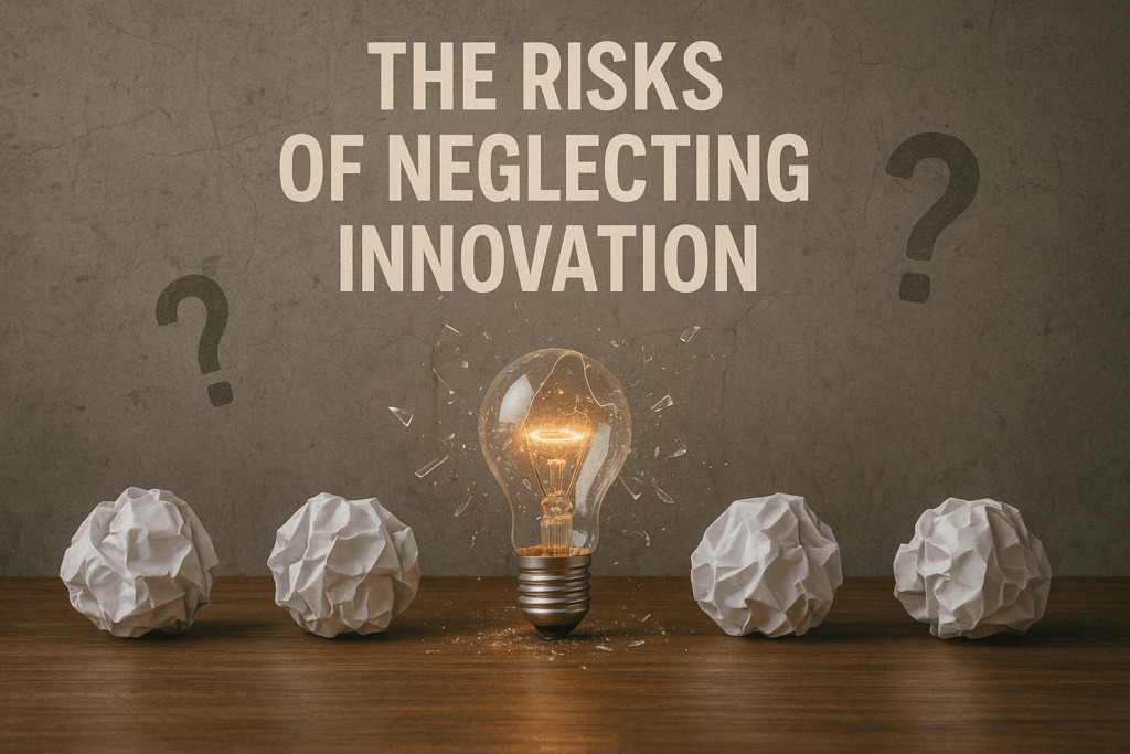 A shattered lightbulb surrounded by crumpled paper balls