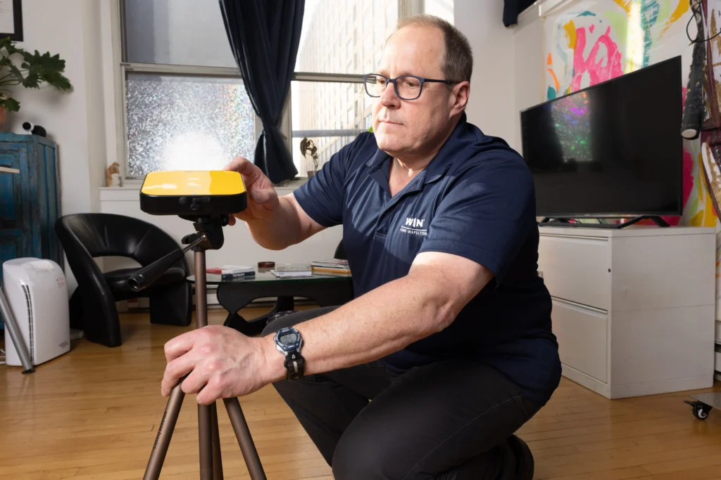 home inspector doing a radon test